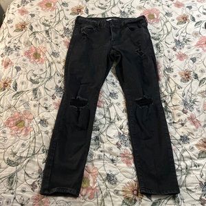 Black, Old Navy brand skinny jeans. Ripped/distressed mid rise jeans.